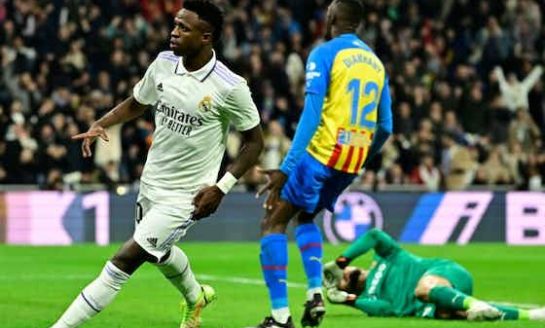 REAL MADRID PILE MISERY ON 10-MAN VALENCIA TO CLOSE GAP AT THE TOP