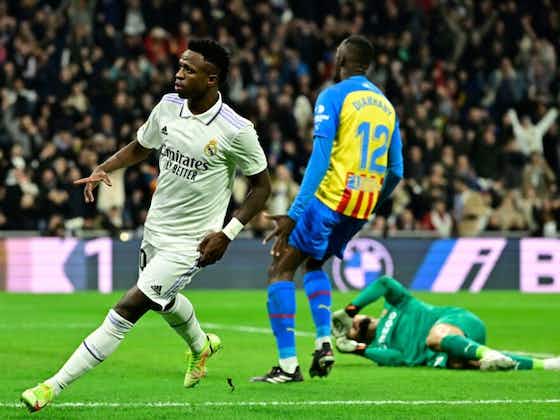 REAL MADRID PILE MISERY ON 10-MAN VALENCIA TO CLOSE GAP AT THE TOP