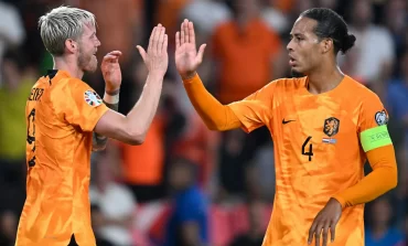 NETHERLANDS SNATCH LATE WIN; PORTUGAL STAY PERFECT; IRELAND CRUISE